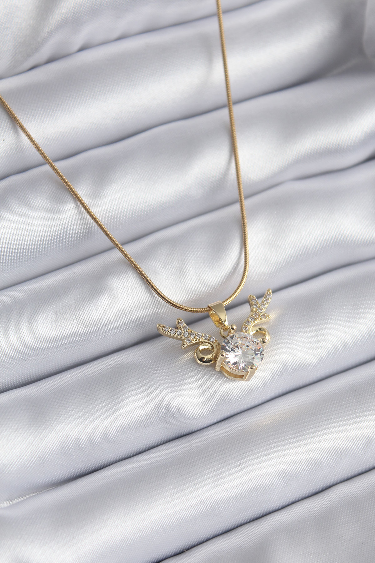 316L Çelik Gold Renk Zirkon Taşlı Boynuz Model Kadın Kolye 5886 1 316L Çelik Gold Renk Zirkon Taşlı Boynuz Model Kadın Kolye 5886