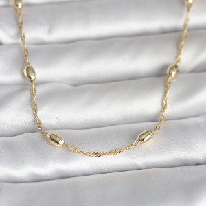 Pirinç Gold Gümüş Renkli Uzun Kıvrımlı Küpe 5886